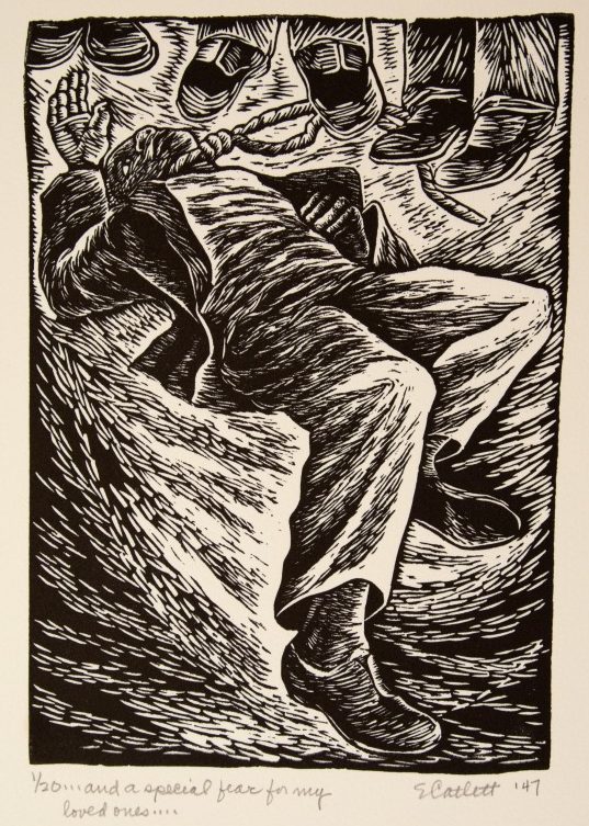 Artist Elizabeth Catlett depicted lynching in one of the 14 linocut prints she created for the series "I Am the Black Woman"