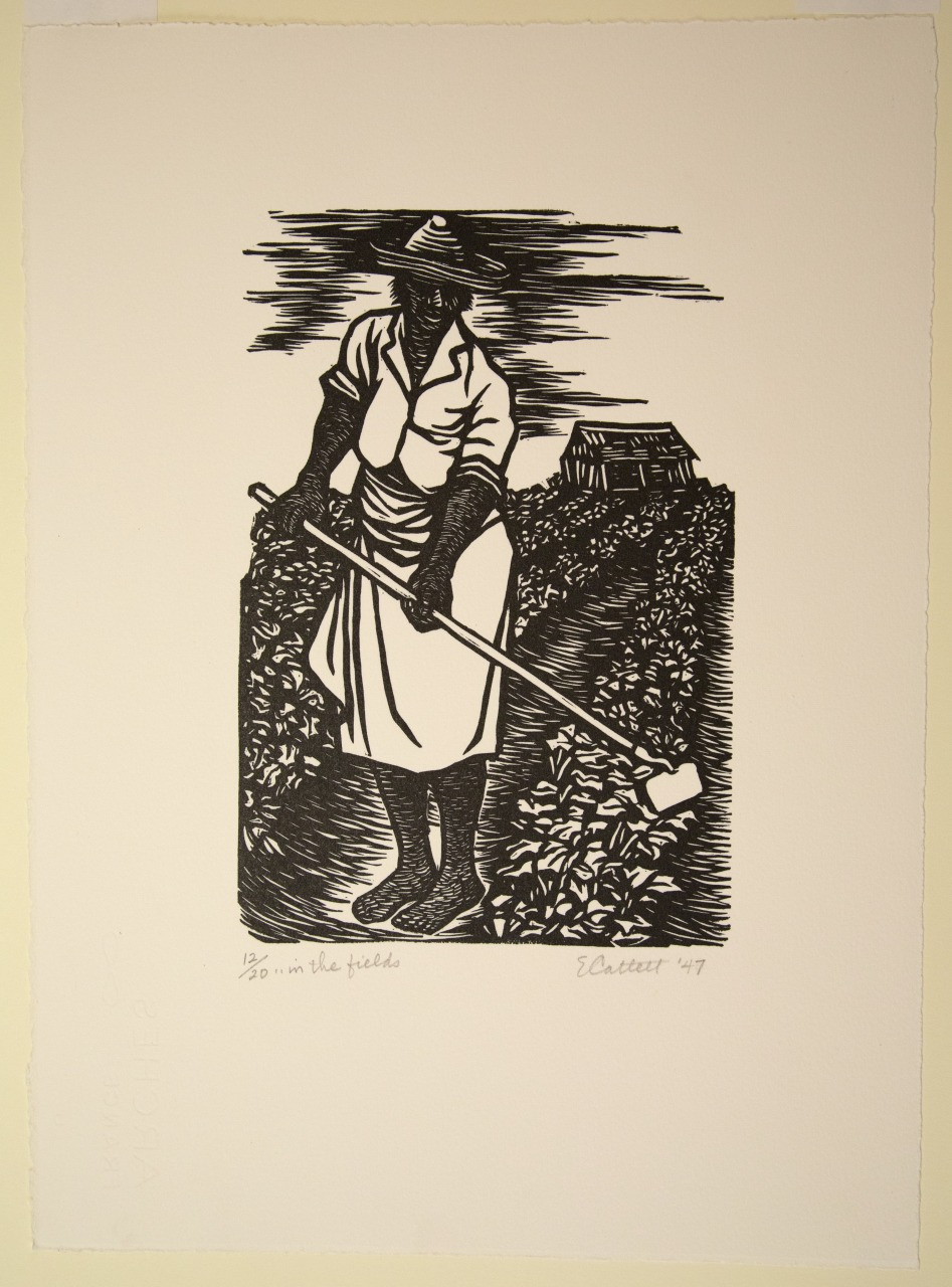 A monochrome print depicts a person in a hat and dress working with a hoe in a field. The background shows foliage and a distant structure under a darkened sky.