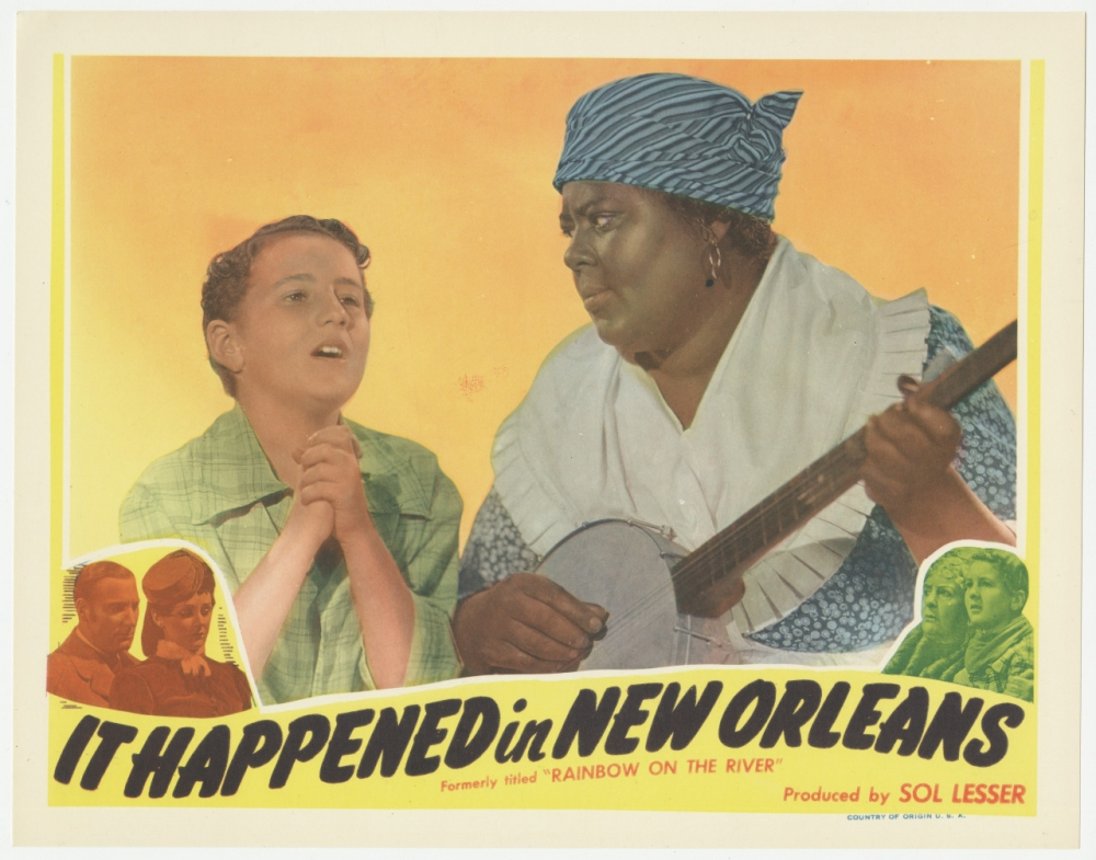 A vintage movie poster titled It Happened in New Orleans shows a young boy with clasped hands beside an older woman in a headscarf holding a banjo. The background is a warm yellow-orange, with a small inset image of two people.