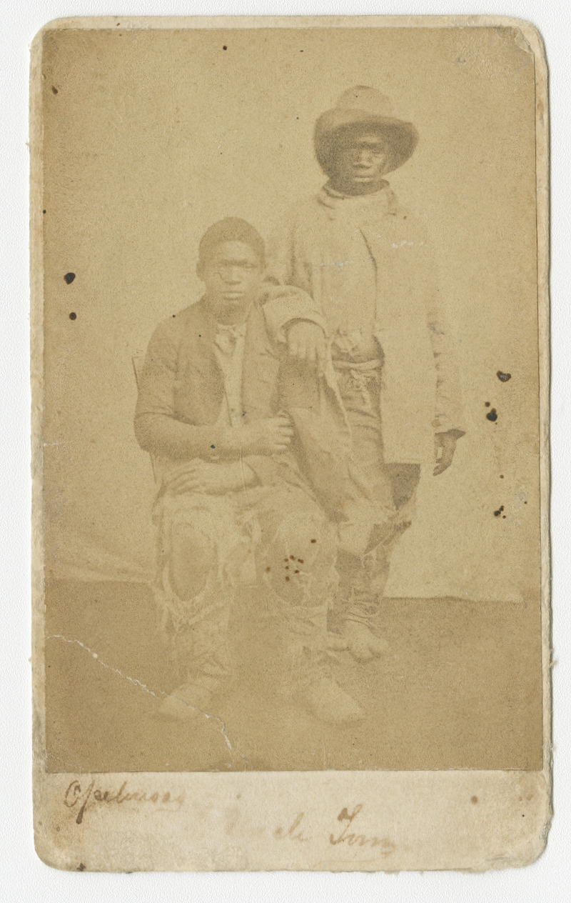 A photograph of two young boys who served as scouts and guides to the Union Army in Baton Rouge, 1863.