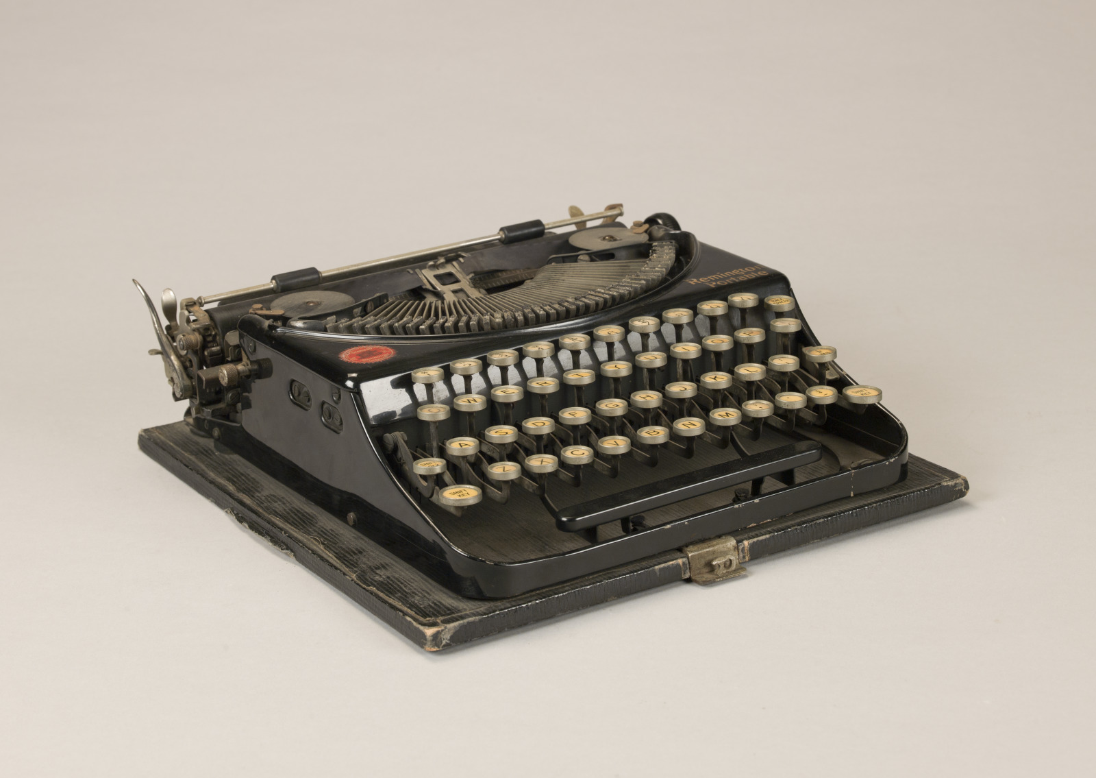 A photo of Tennessee Williams’s Remington typewriter used while writing "A Streetcar Named Desire." It is a dark grey color with ivory-colored keys.