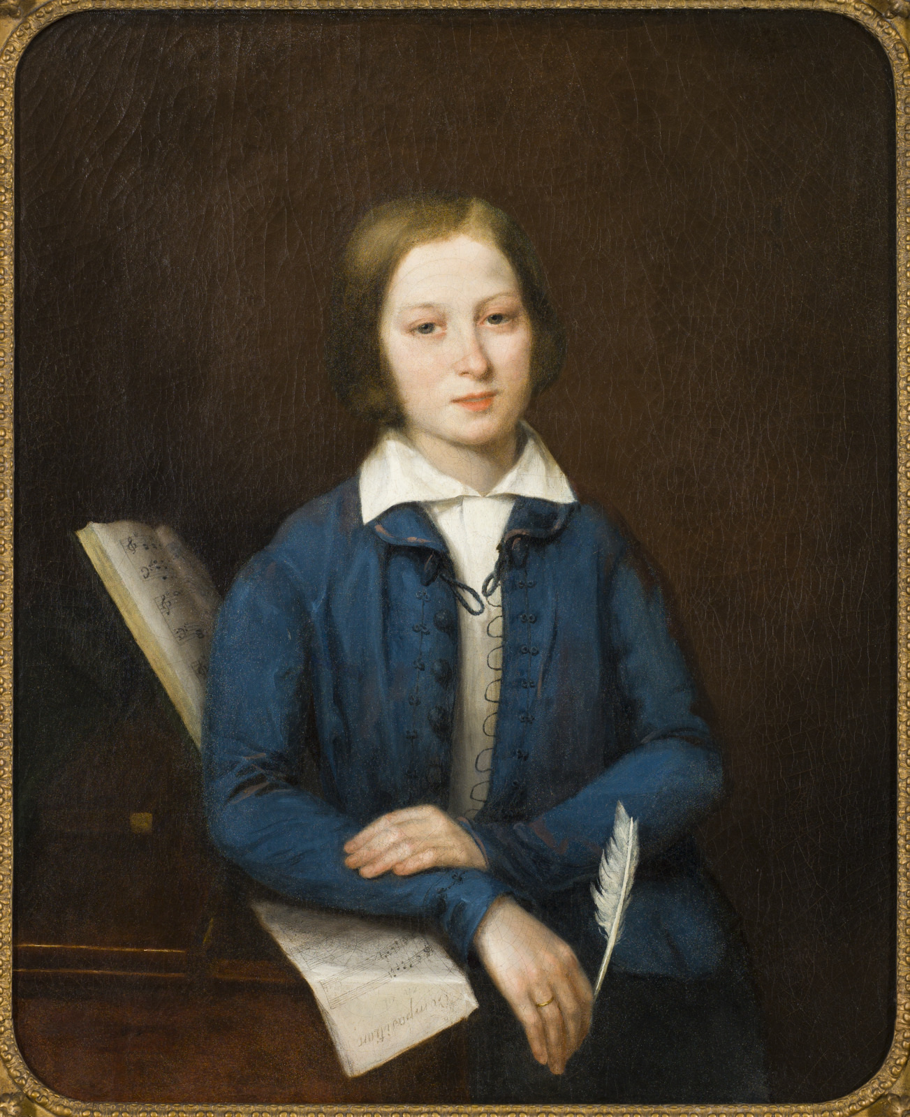 A portrait of a young person in historical clothing, wearing a blue jacket over a white shirt. They are holding a quill and leaning on a table with sheet music, set against a dark background.