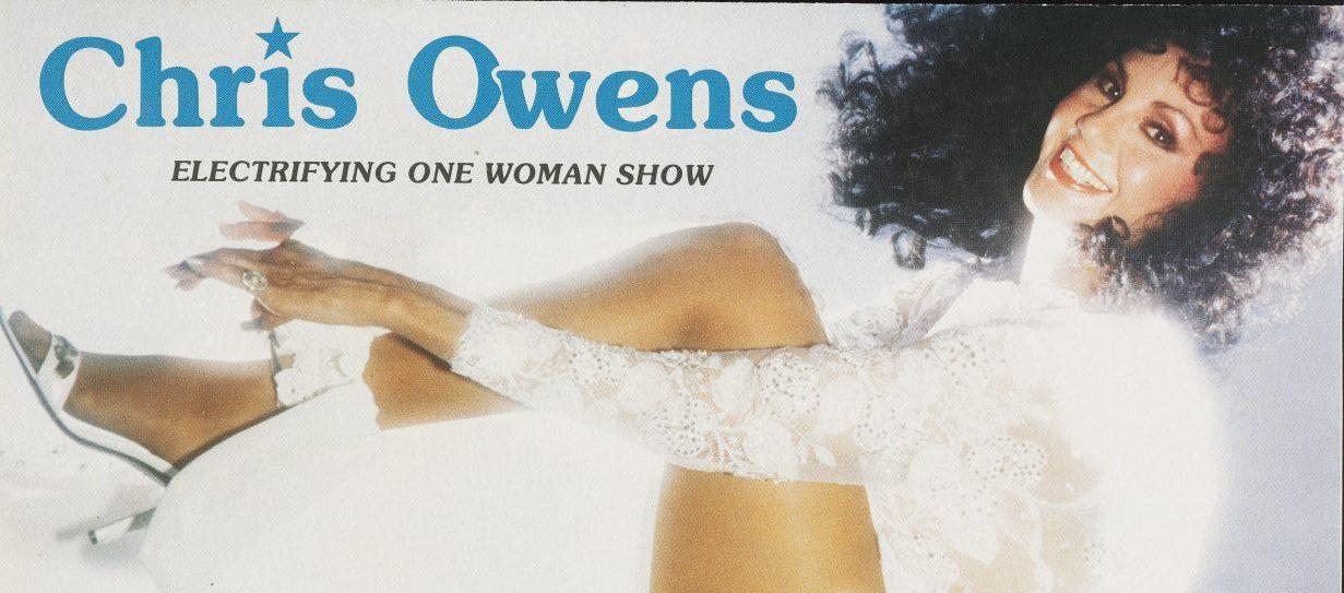 A smiling woman with curly hair poses in a white outfit and heels. Text reads Chris Owens: Electrifying One Woman Show.
