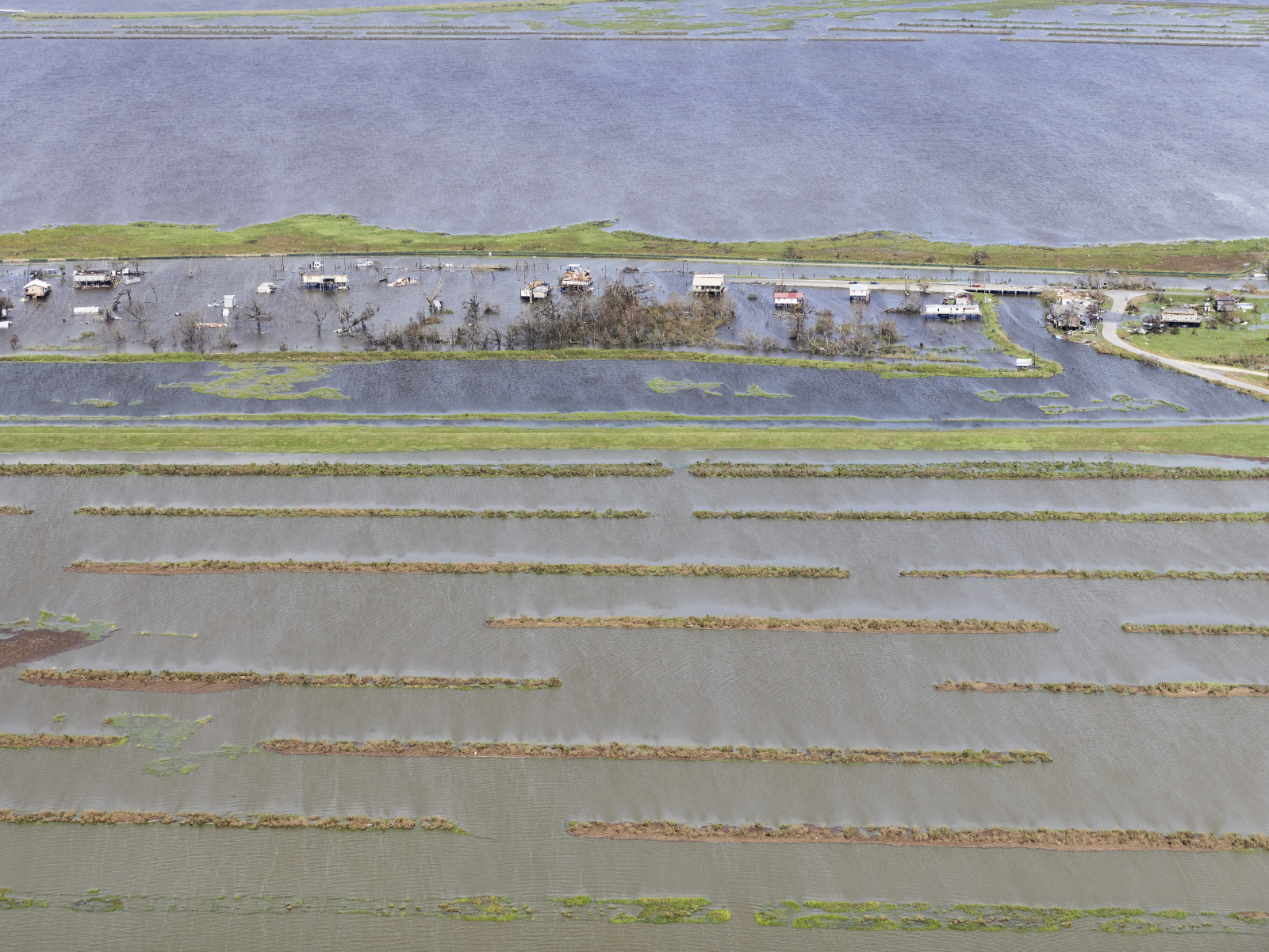 Aerial view of the flooded community and environs of Pointe-aux-Chenes in Terrebonne Parish following Hurricane Ida in August 2021.