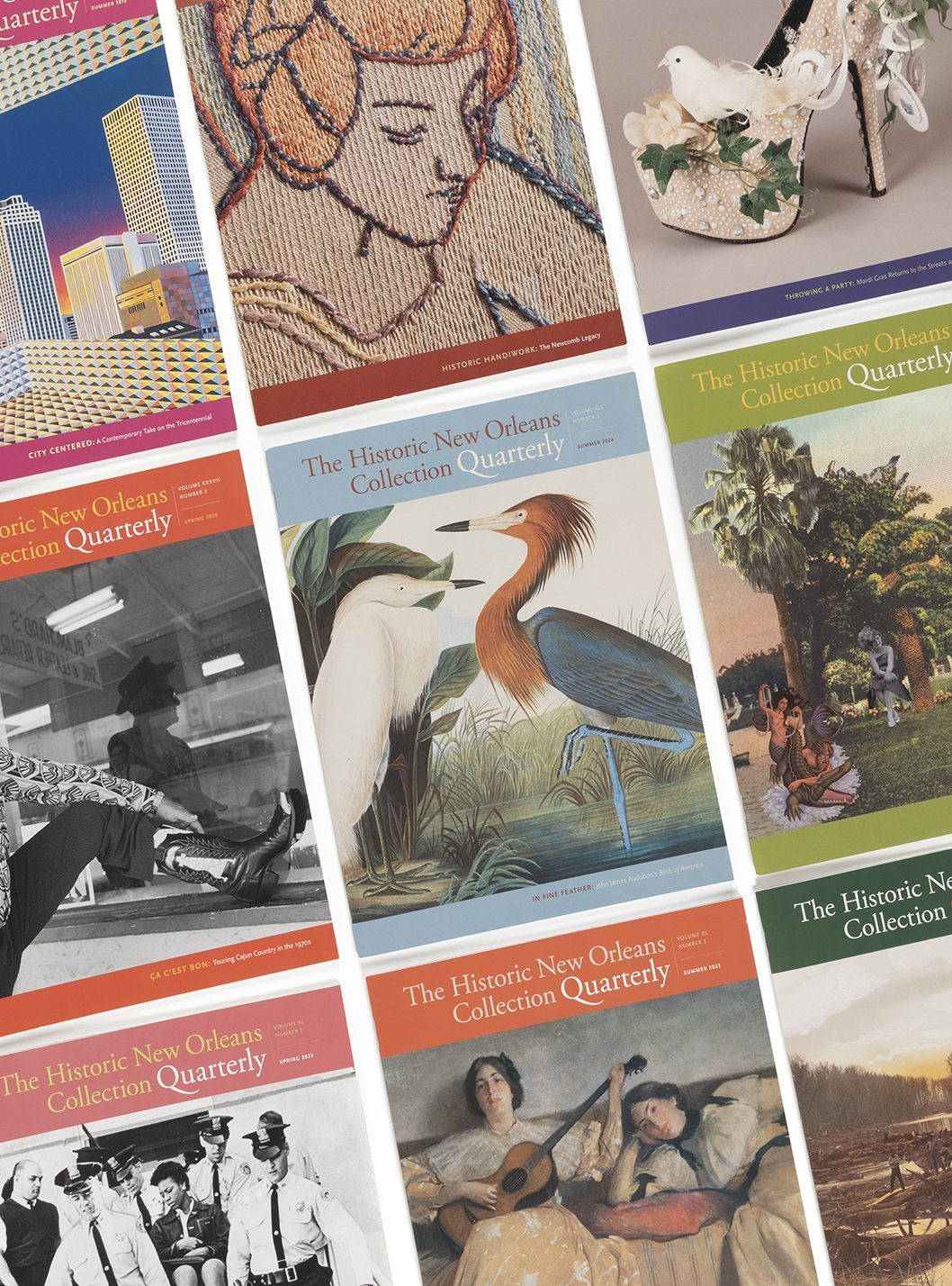 A collection of The Historic New Orleans Collection Quarterly magazines displayed in a grid. Covers feature diverse art, including birds, cityscapes, musicians, and historical scenes, with vibrant colors and intricate designs.