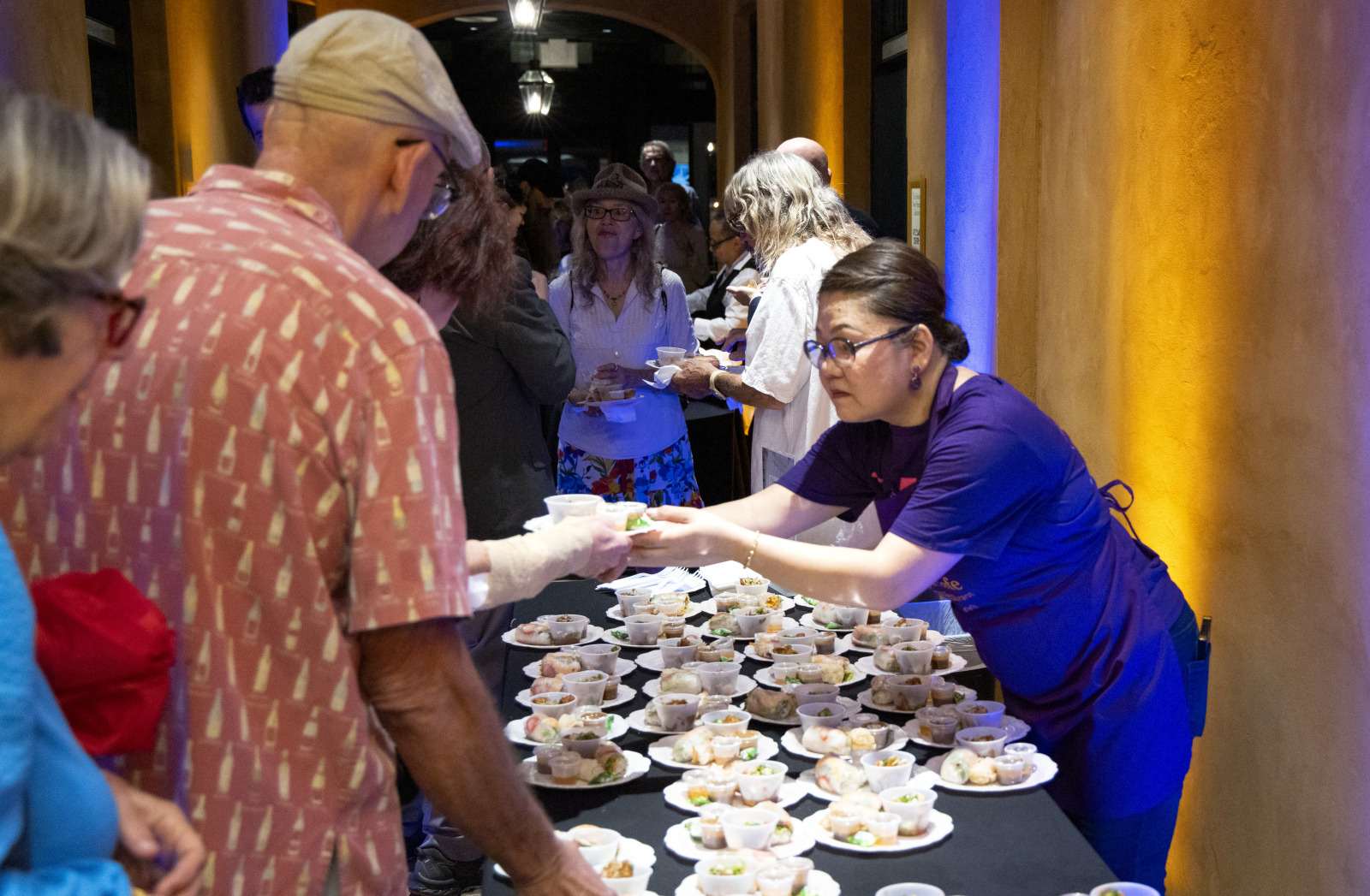 Guests are served catered food at HNOC's annual Food Forum.