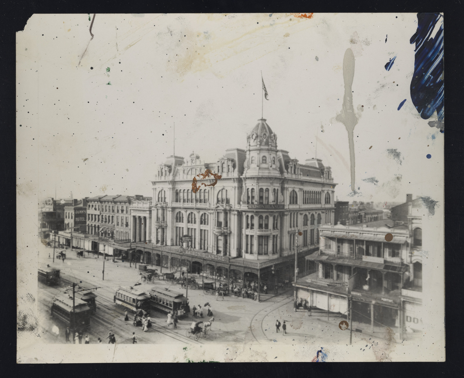 Black and white photo showing the original (smaller) Maison Blanche building at 901 Canal Street, ca. 1900.