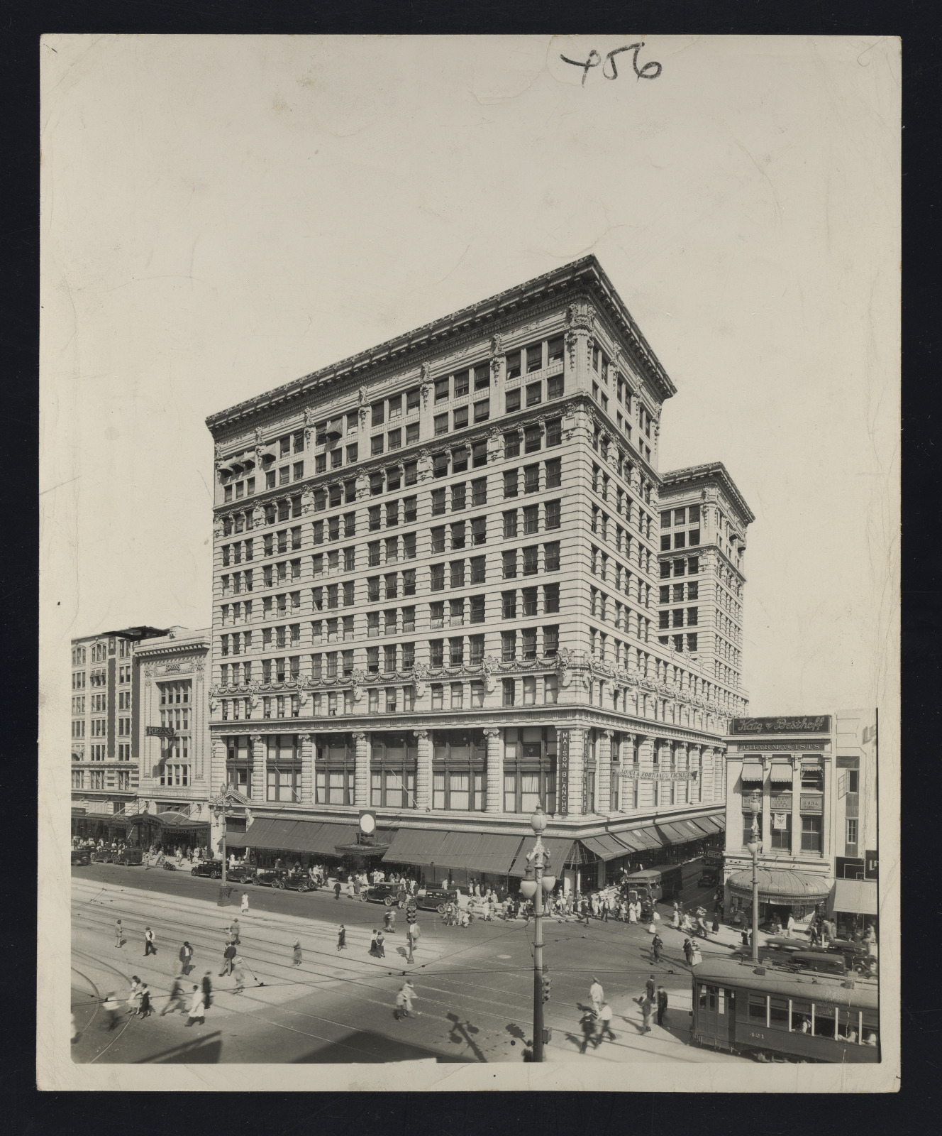 Black and white photo showing the exterior of Maison Blanche department store on Canal Street, between 1920 and 1940.