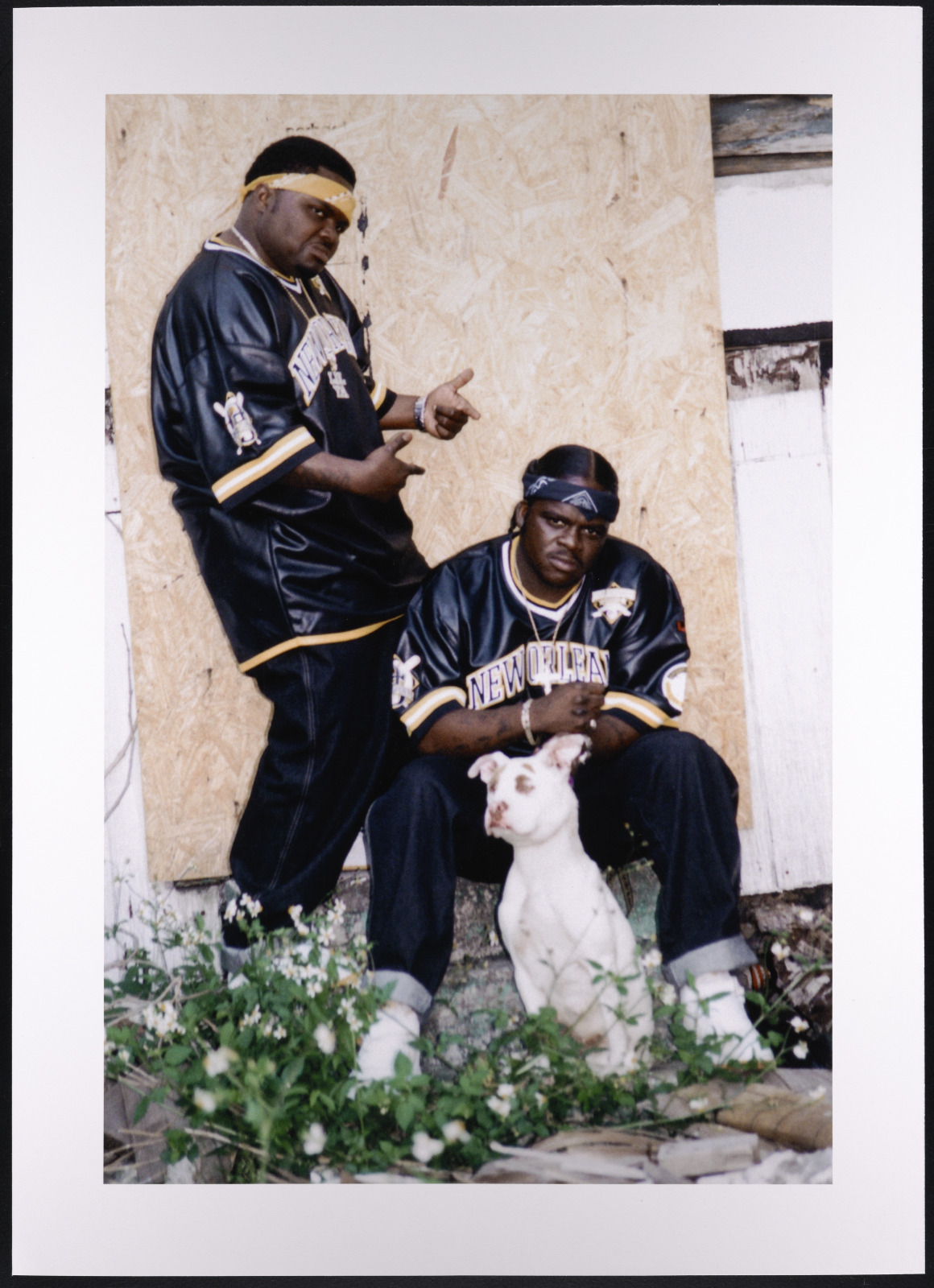 Lil Ya and Tec-9 pose with a dog, between 1985 and 1995