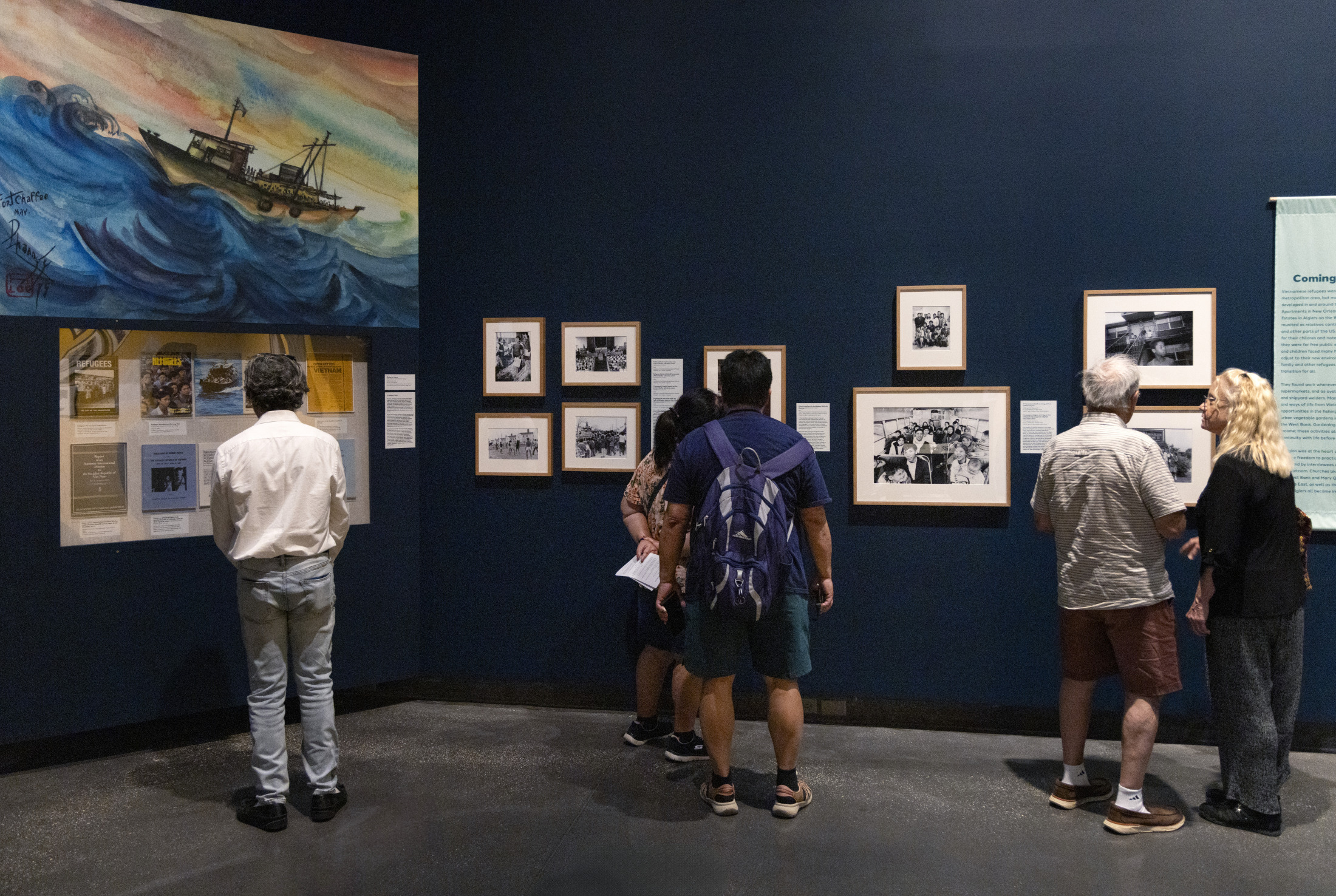 Visitors view an exhibition installation at HNOC.