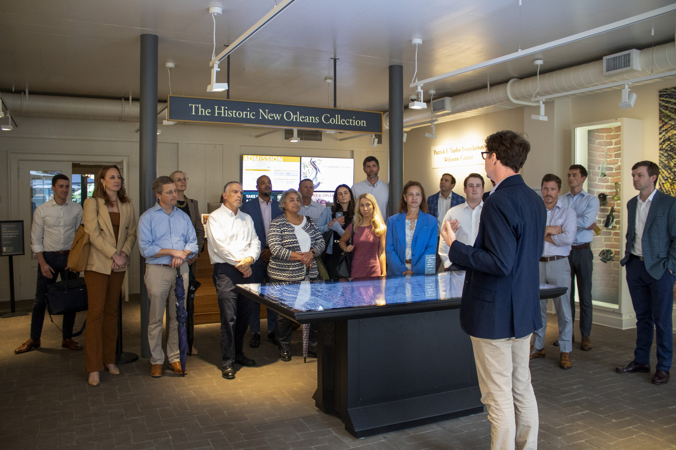 A large group of people attend a tour at HNOC.