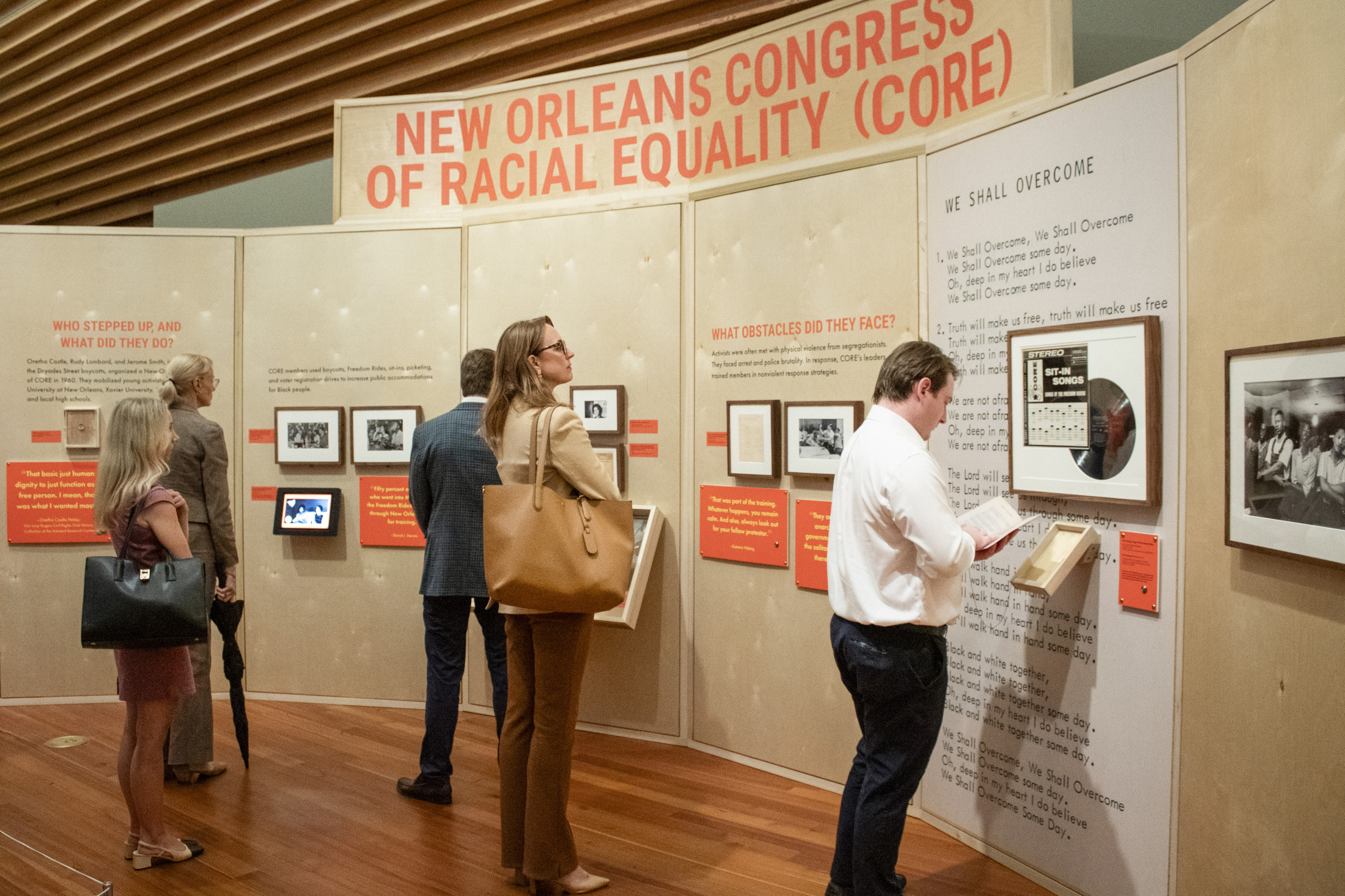 A group of visitors attend an exhibition at HNOC.
