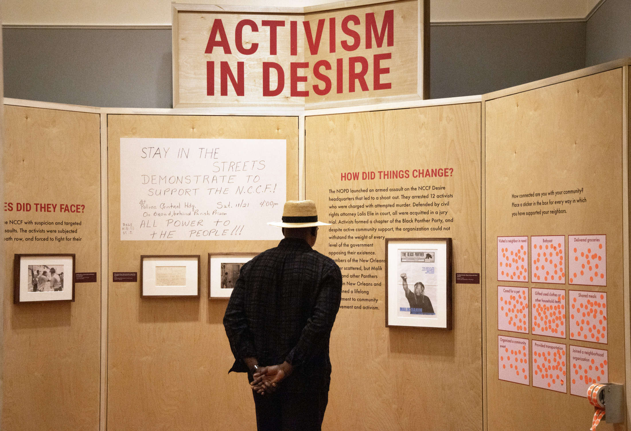 Visitors explore "The Trail They Blazed" exhibition at HNOC.