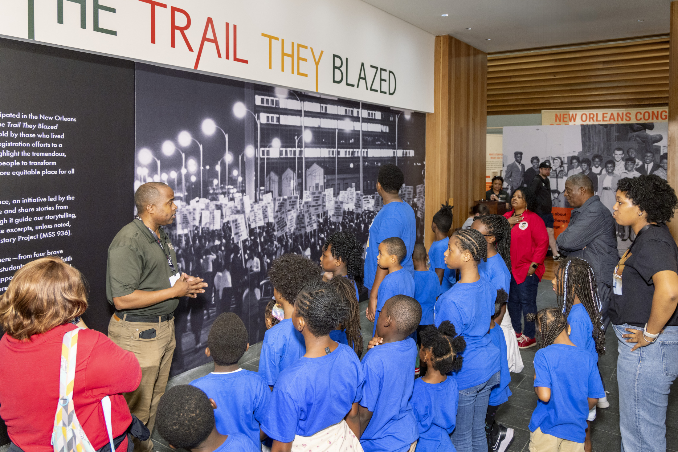 Children participate in a field trip at HNOC's "The Trail They Blazed" exhibition.