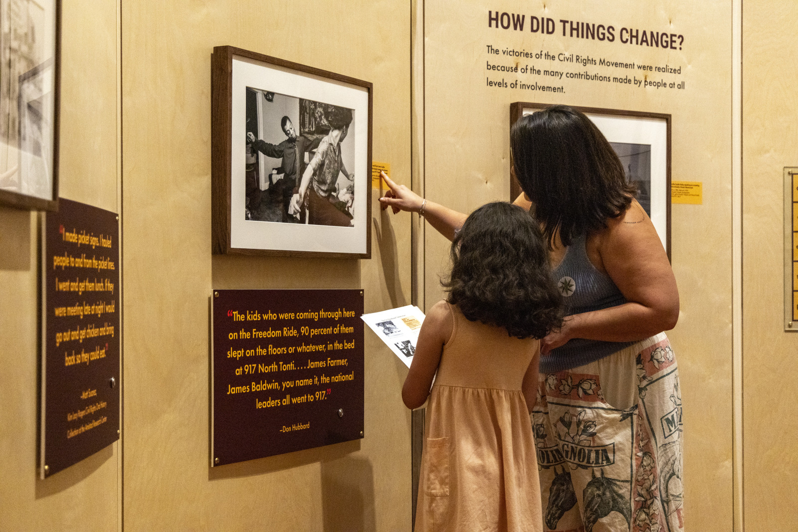 A view of two visitors exploring "The Trail They Blazed" exhibition at HNOC.