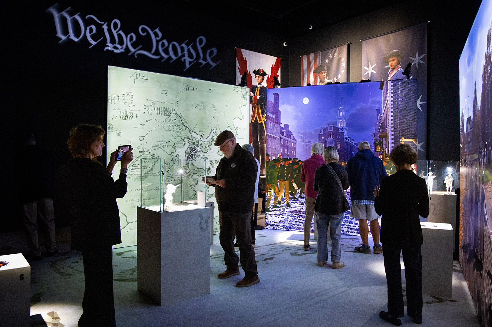 Visitors explore "American Revolution: The Augmented Exhibition" at HNOC.
