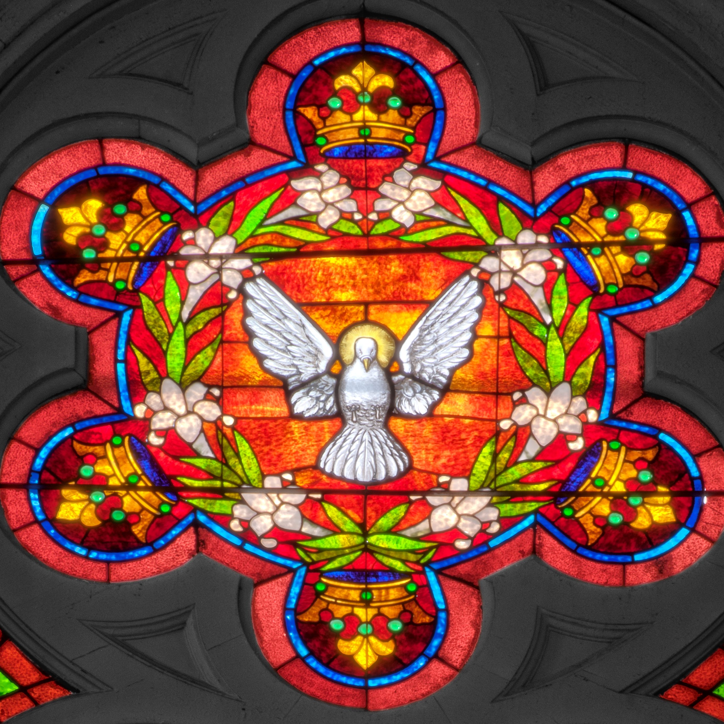 Detail of a stained glass window at Saints Peter and Paul Catholic Church (now Hotel Peter and Paul).