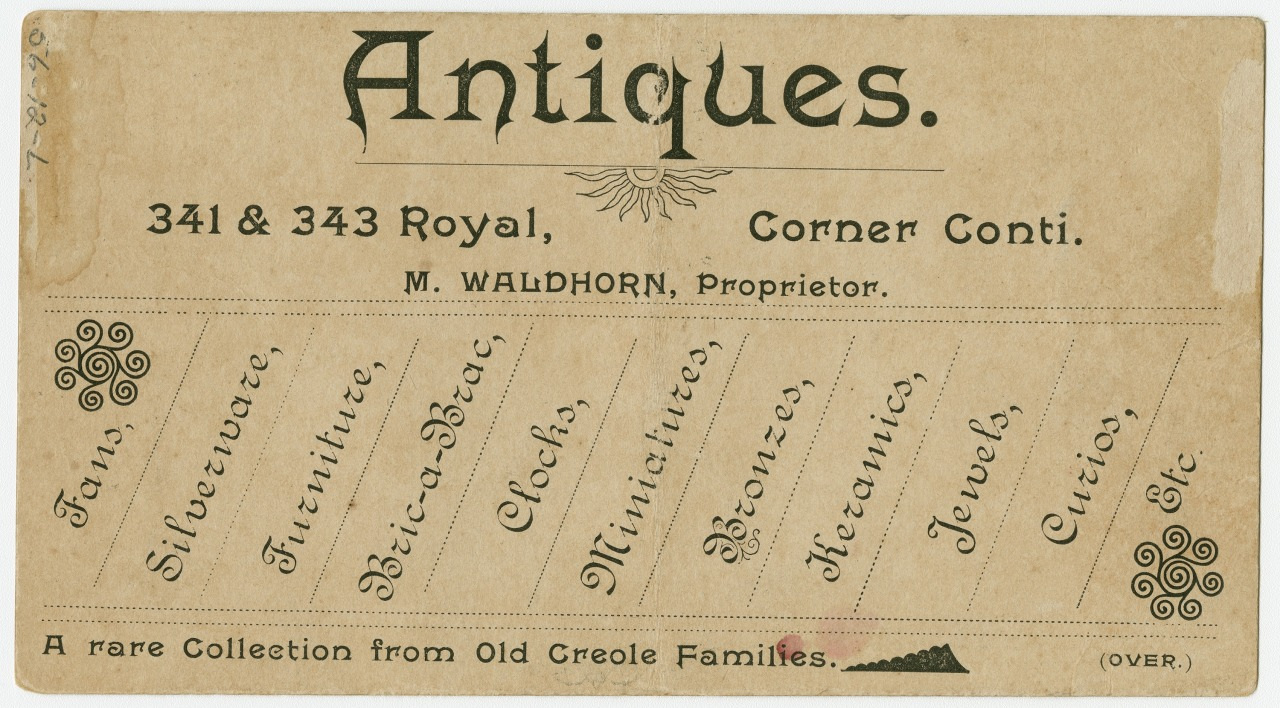 Vintage advertisement for Antiques by M. Waldhorn, located at 341 & 343 Royal, Corner Conti. Offers items like fans, silverware, furniture, bric-a-brac, and more, described as A rare Collection from Old Creole Families. Decorative border elements included.