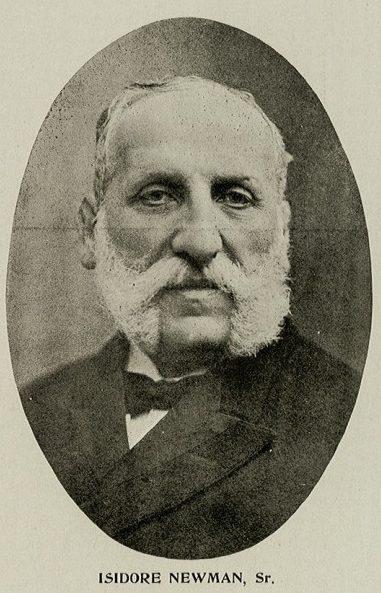 A vintage black-and-white portrait of an older man with thick sideburns and a mustache, wearing a dark suit and bow tie. The oval frame has the name Isidore Newman, Sr. printed below.
