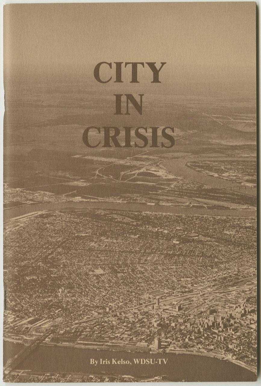 Sepia-toned aerial view of a city with a large river and surrounding landscape. The text reads City in Crisis with credit to By Iris Kelso, WDSU-TV at the bottom.