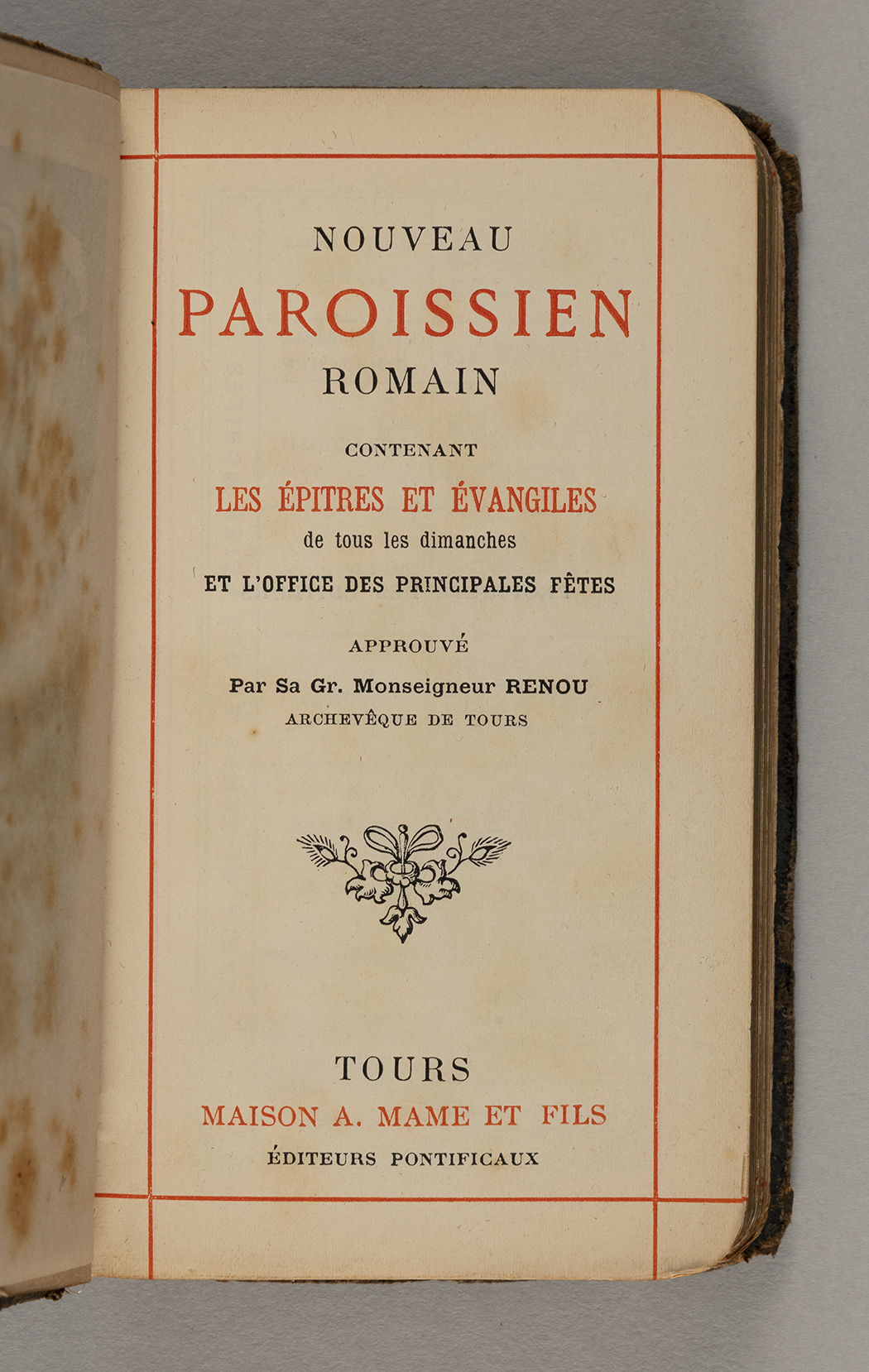 The inside cover of a leather-bound prayer book, with the title and publishing information written in French.