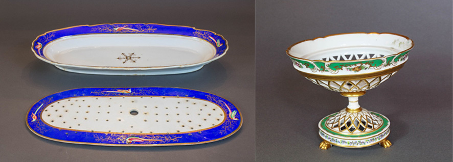 An ornate blue and white oval porcelain dish with a matching perforated insert on the left. On the right, a decorative green and white pedestal bowl with a lattice design and gold accents. Both items are on a gray background.