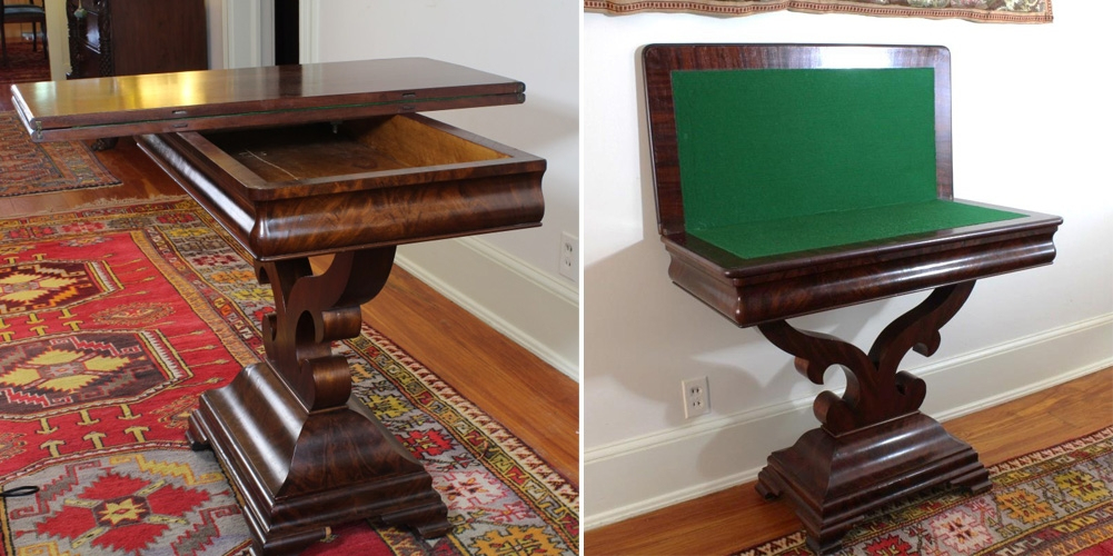 Two images of a wooden table with ornate legs, shown in open and closed positions. The table has a hidden compartment and green felt surface when open. The room features colorful rugs and wooden flooring.