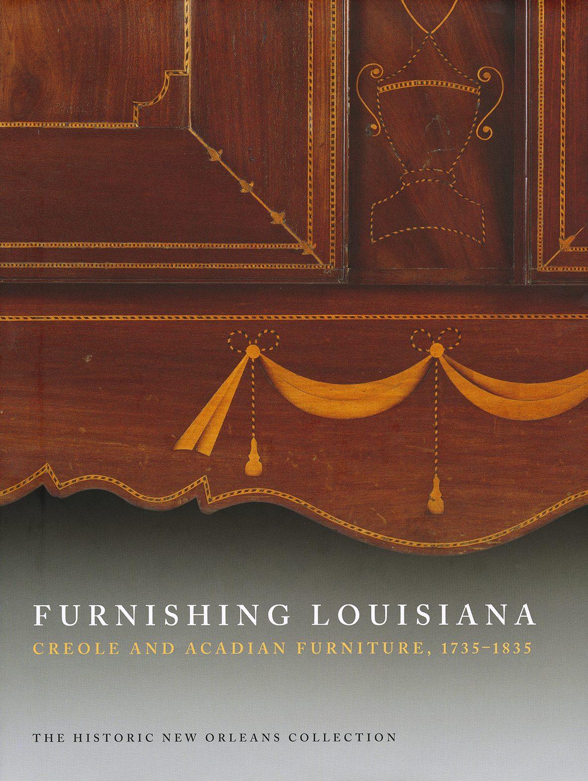 Cover of Furnishing Louisiana: Creole and Acadian Furniture, 1735-1835 by The Historic New Orleans Collection. Features ornate wooden furniture detail with decorative patterns and tassel-like designs.