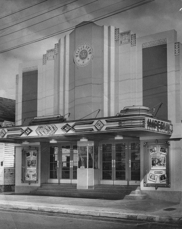 A black and white photo of the Imperial Theatre