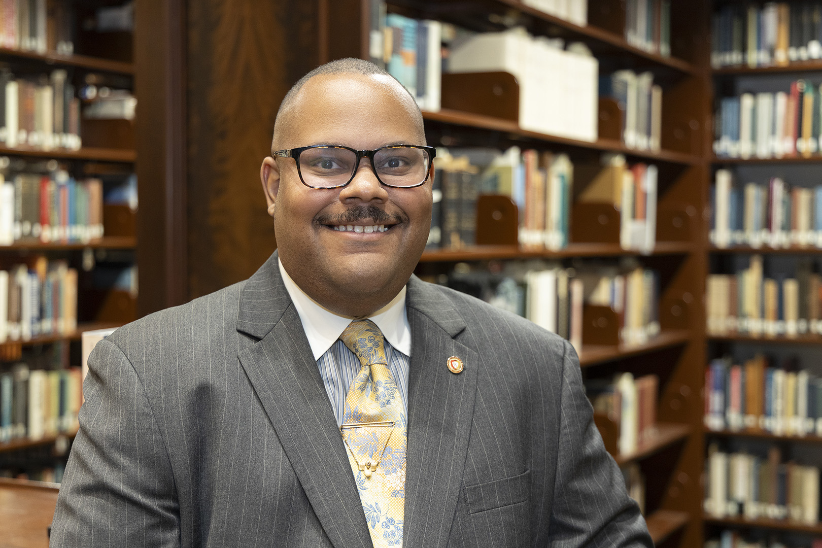 HNOC historian Jari C. Honora poses for a photo at the Williams Research Center.