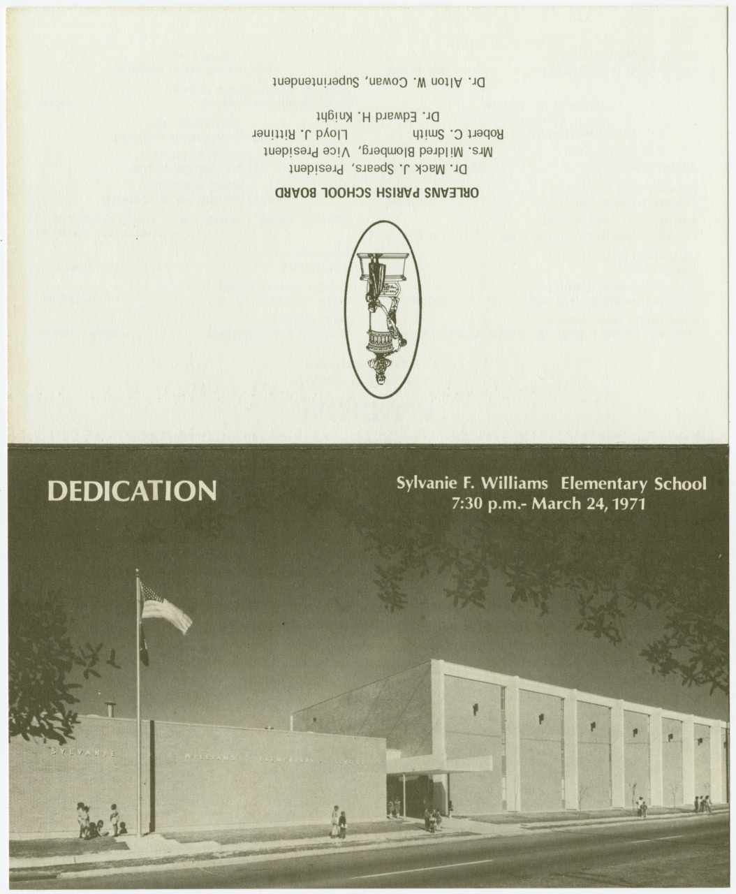An upside-down program cover for the dedication of Sylvanie F. Williams Elementary School on March 24, 1971, featuring a black-and-white photo of the school building with a flagpole, and a list of school board members at the top.