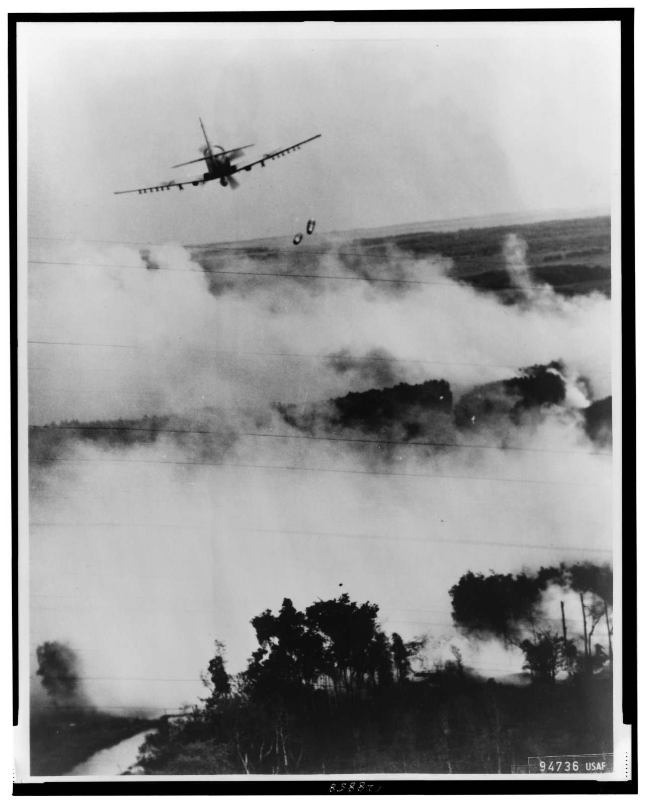 A South Vietnamese plane drops bombs on a Việt Cộng hideout, 1967.