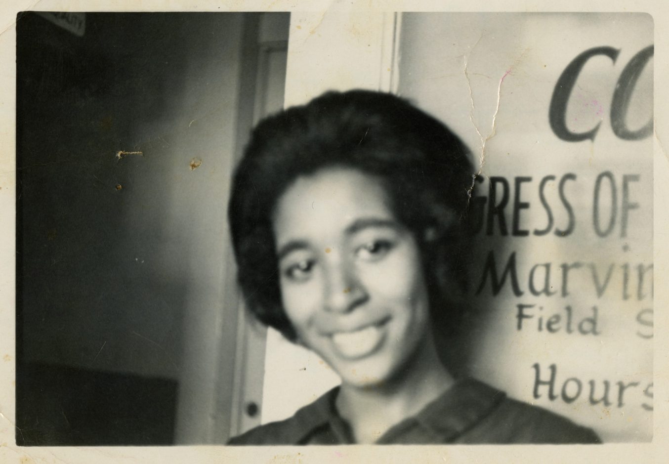 A black and white photo of Dodie Smith-Simmons