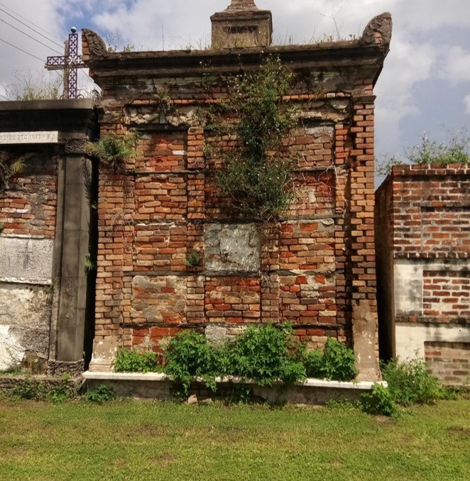 Tomb of the Société des Fleurs de Marie, Bienville Alley Tomb No. 13, St. Louis Cemetery No. 2, where Rose Nicaud is buried.