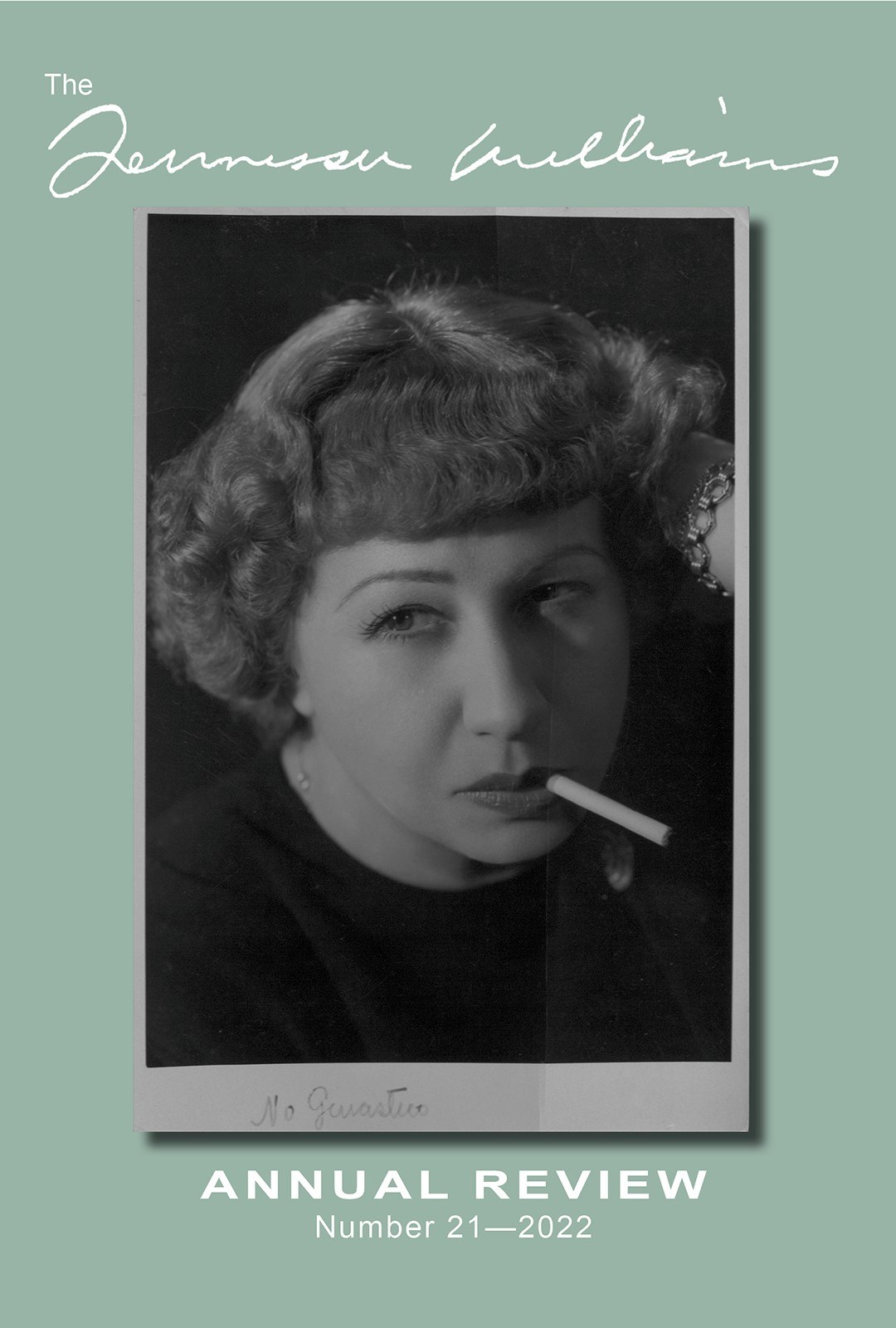 Black and white photograph of a woman with curly hair, holding a cigarette in her mouth. She appears thoughtful. The image is the cover for the Tennessee Williams Annual Review 2022, featuring his signature at the top.