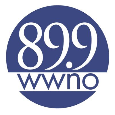 Blue circle logo with large white numbers 89.9 above smaller white letters wwno.