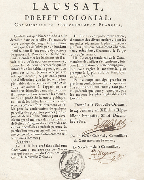 A historical document with text in French titled Laussat, Préfet Colonial. It discusses arrangements for a fire brigade, mentioning their uniforms and bells. The document is dated 16 December 1803 and signed by Laussat and V. Mazois.
