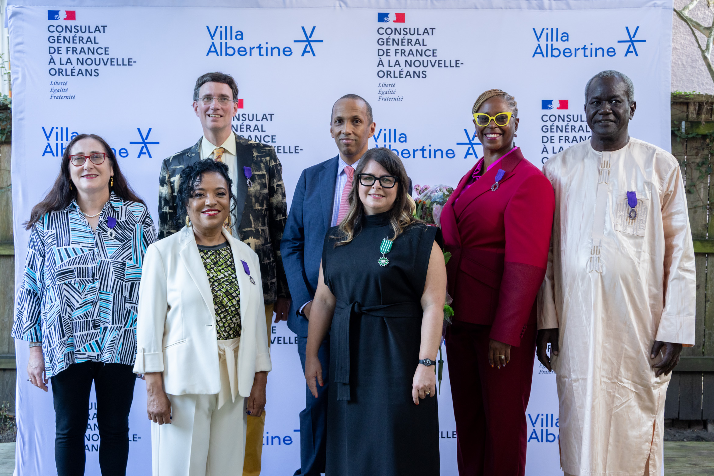 Erin Greenwald poses for a photo among a host of New Orleans cultural leaders.