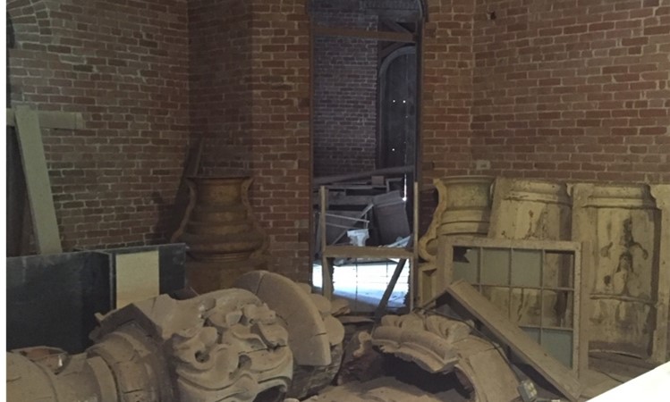 Photo of the unfinished second floor of Longwood plantation, showing plaster molds on the floor that were never installed.