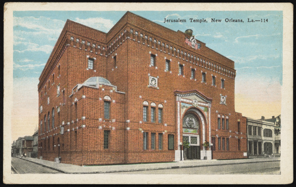 A vintage postcard depicting the Jerusalem Temple in New Orleans, Louisiana. The building is a large, ornate brick structure with decorative architectural elements and a prominent entrance. The sky is clear with subtle pastel hues.