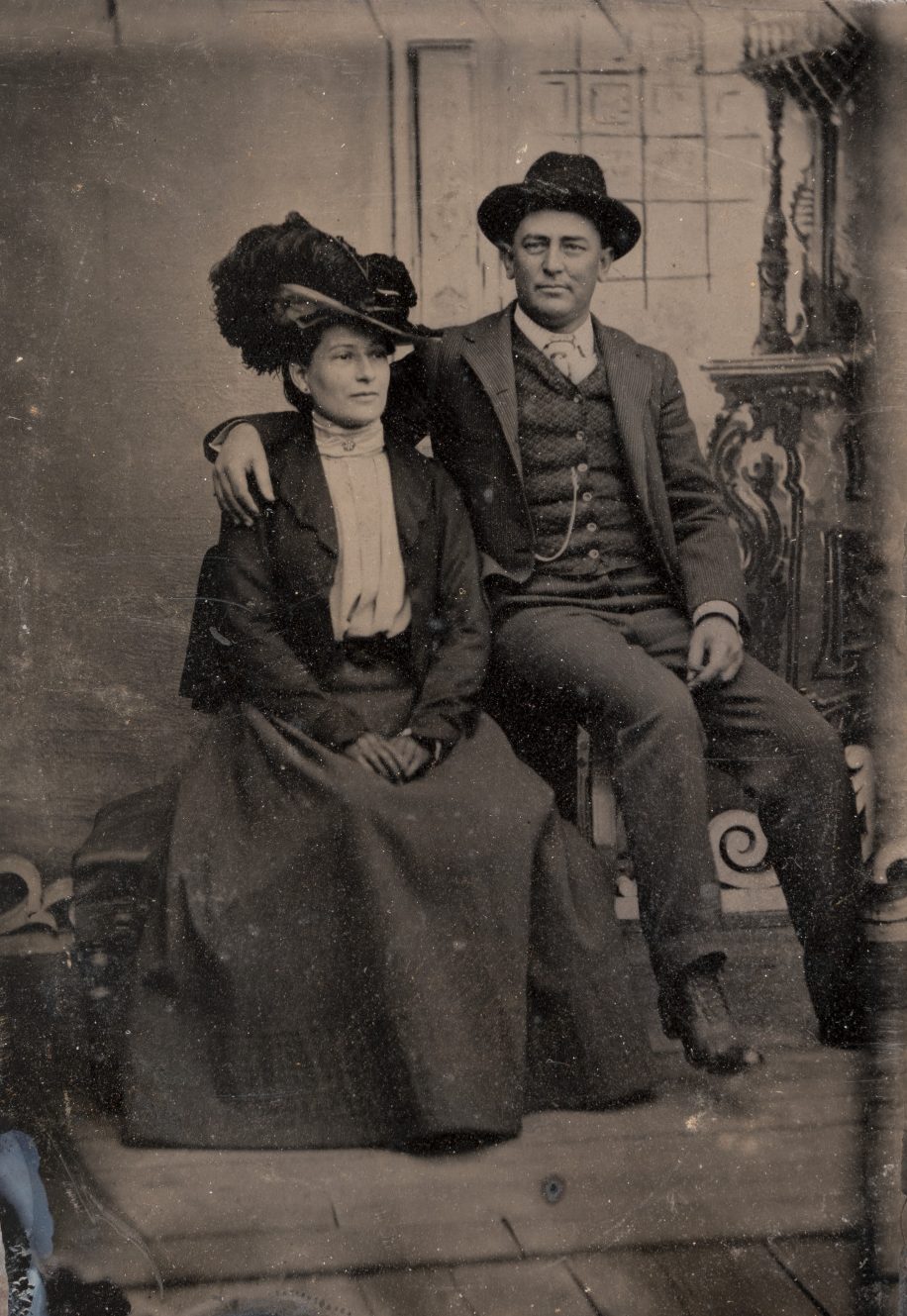 A tintype photo shows Caliste Martinez Fucich and S. M. Fucich seated next to each other.