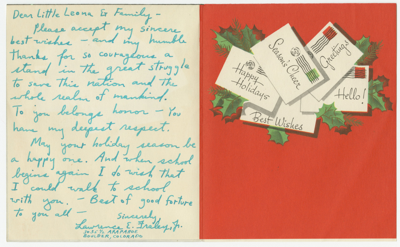 A holiday greeting card with handwritten note on the left and illustrated letters on the right. The note expresses heartfelt wishes and gratitude. Green holly leaves and red berries embellish the background.