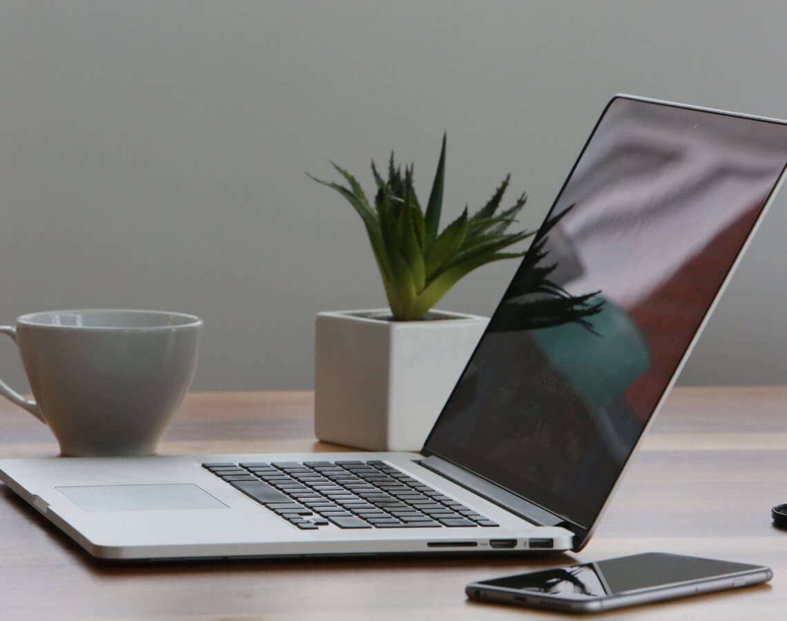 Macbook pro iphone cup desk