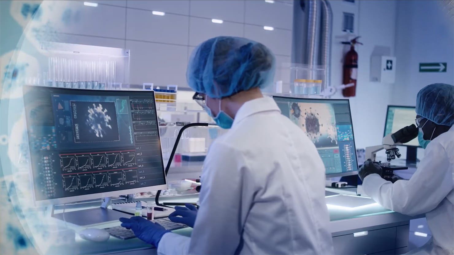 Researcher working on computer in lab