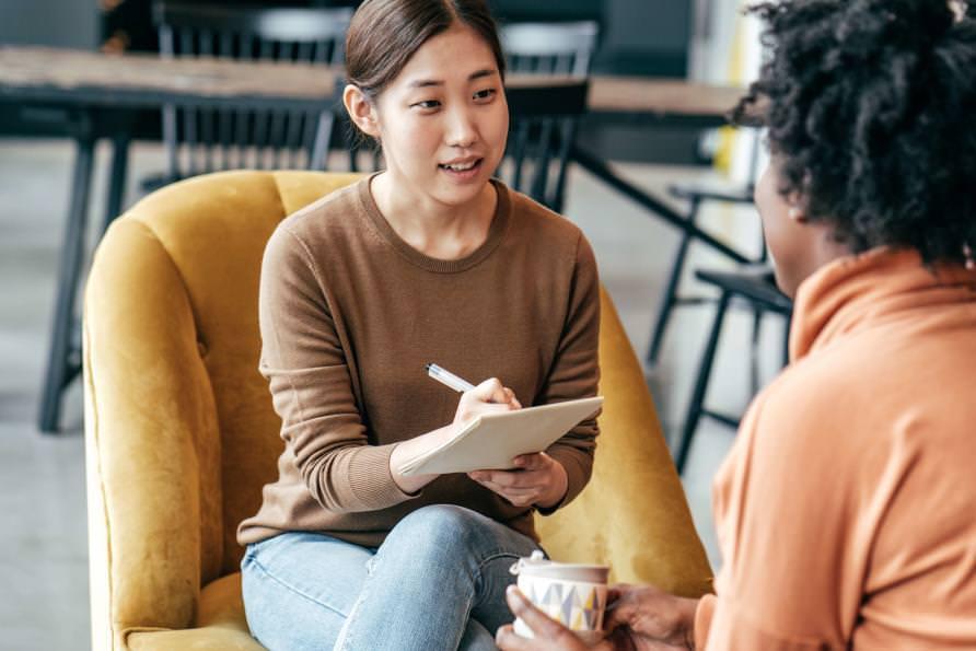 Woman conducting a research interview