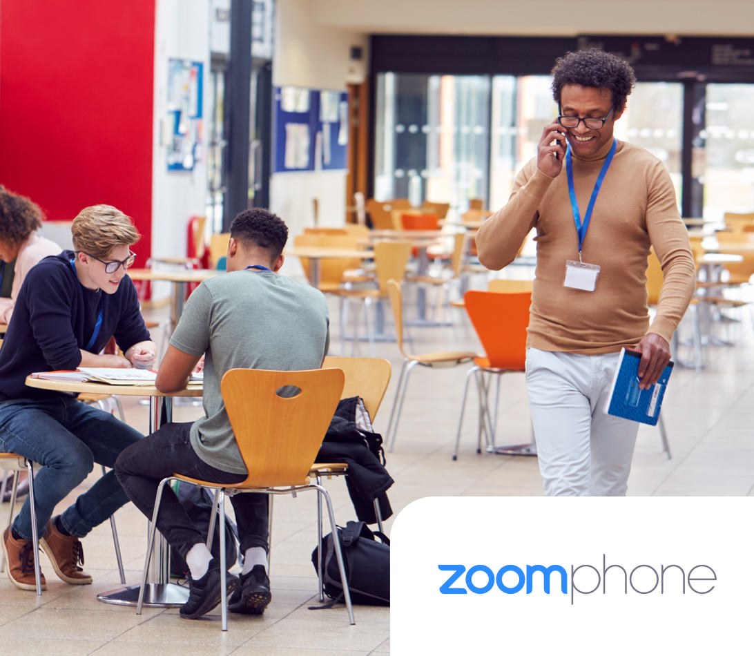Zoom Phone voice communication services teacher walking in university on phone