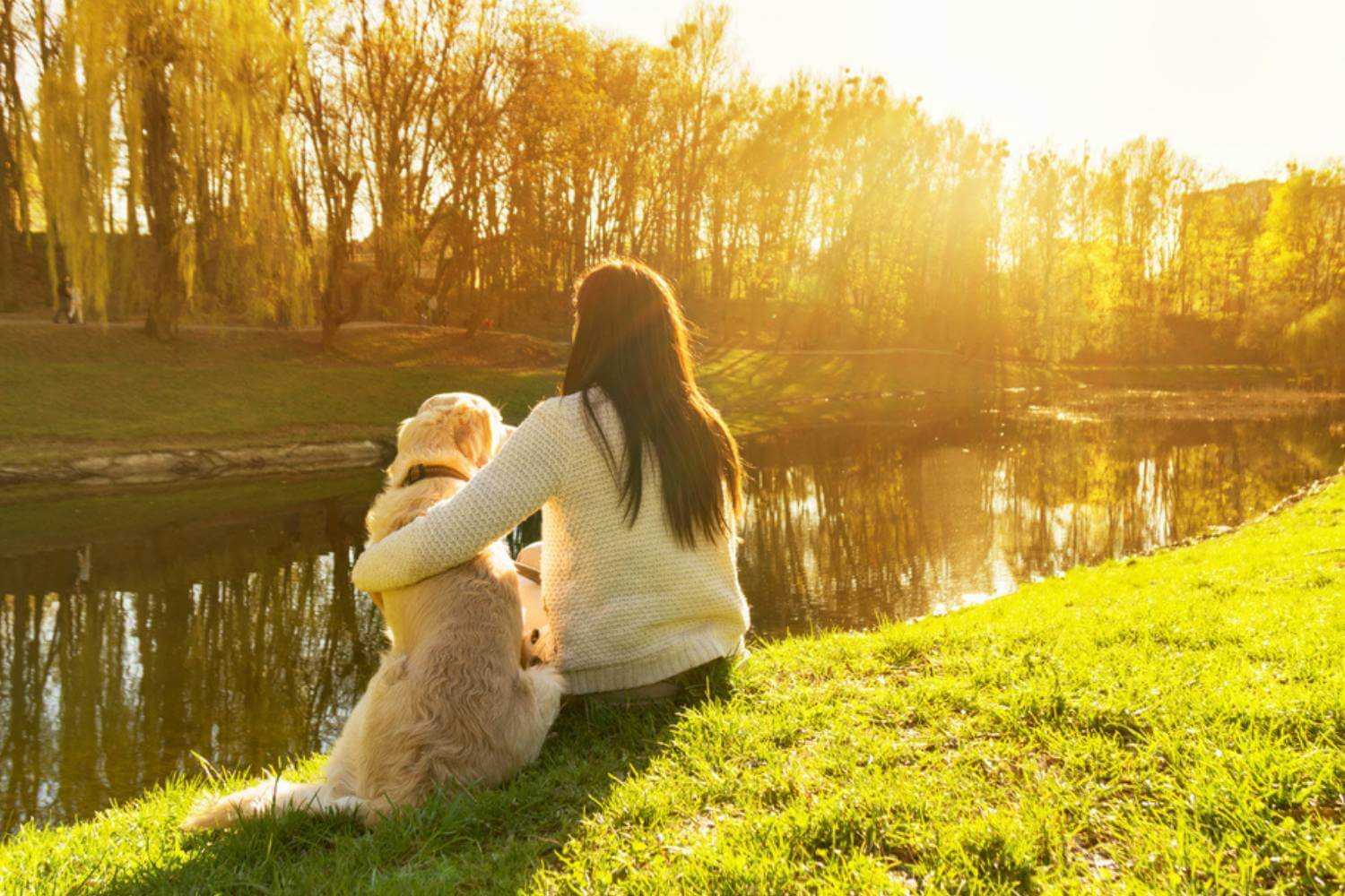 Wichita KS Woman watching Sunset with Dog