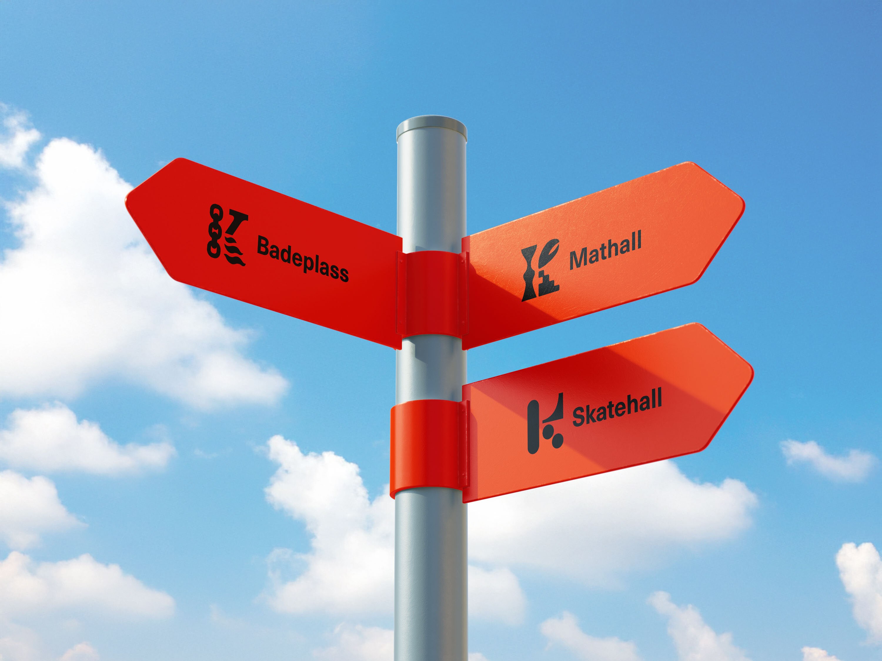 Foto av en stolpe med tre oransje skilt.