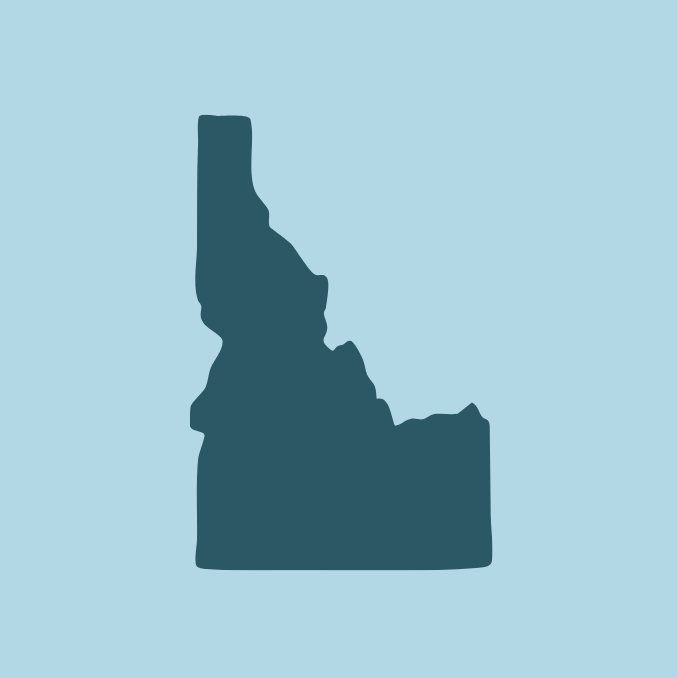 An outline of the state of Idaho in dark teal on a lighter teal background (DPI standard color palette).