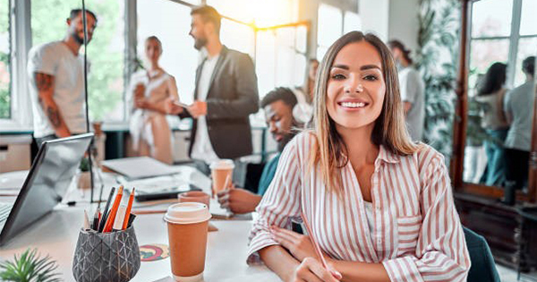 Woman in office of men